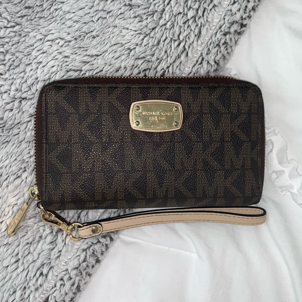 Michael Kors continental wristlet.